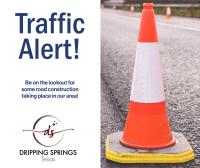 Traffic alert graphic with orange cone